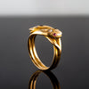 A Gold Snake Ring with Diamond & Ruby Eyes