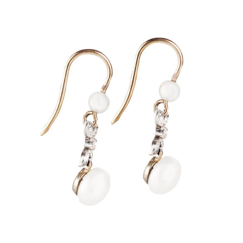 A pair of Pearl Diamond earrings