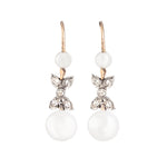 A pair of Pearl Diamond earrings