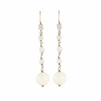 Elegant 1930s drop earrings featuring luminous opals and diamonds set in 15ct gold, British-made, with a romantic and timeless design.”
