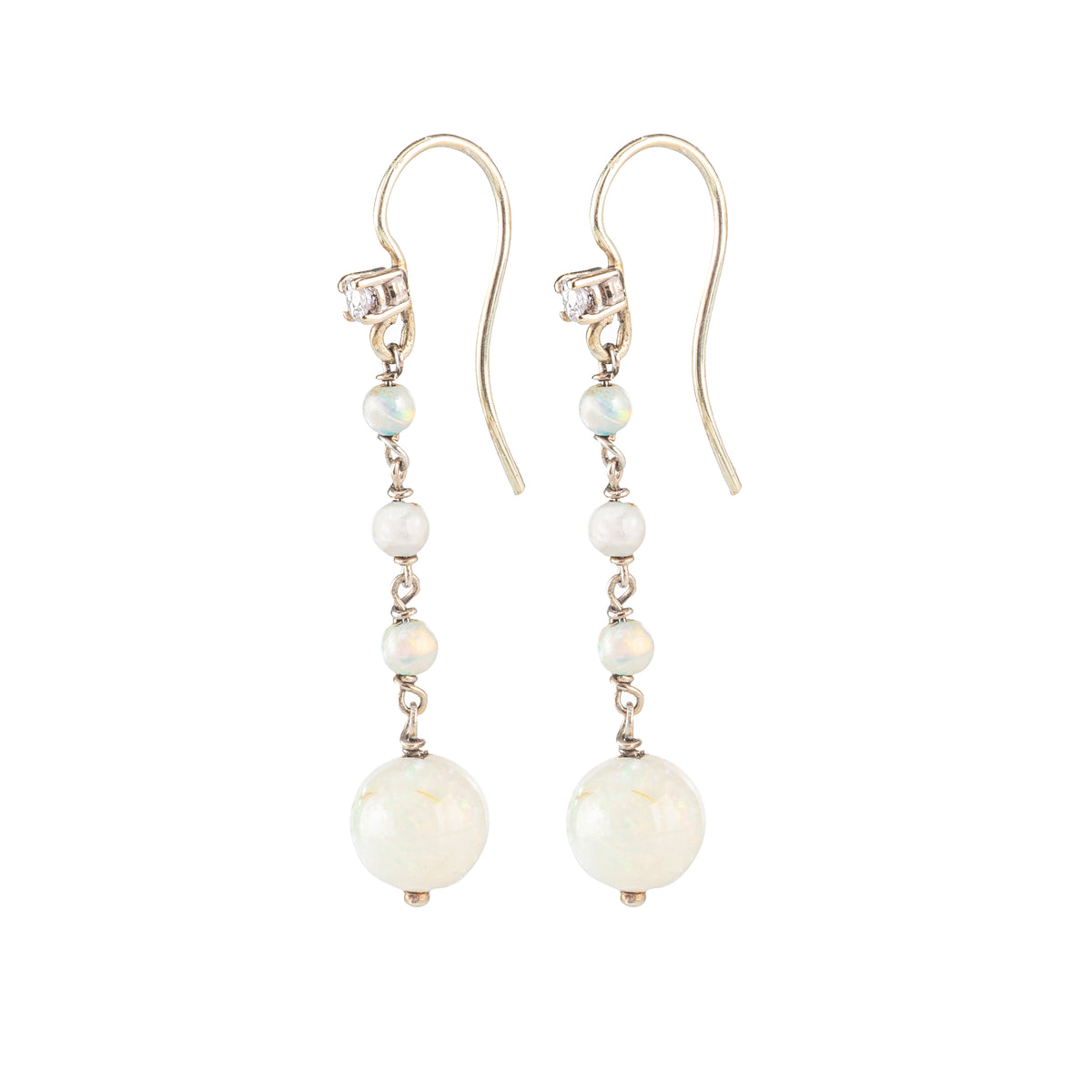 Side view of 1930s opal and diamond drop earrings, showcasing the elegant design and the fine setting in 15ct gold.