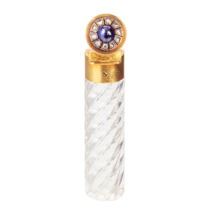 French antique gold scent bottle with sapphire and diamond-set lid, faceted crystal body, and glass liner, circa 1900.