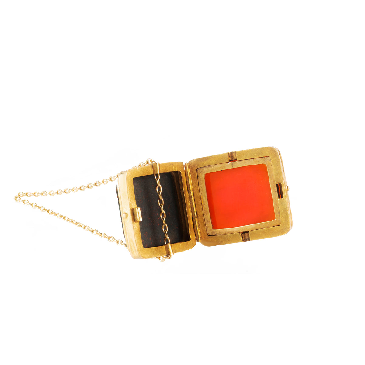 Antique gold fob pendant opened to reveal hidden compartment, Victorian era