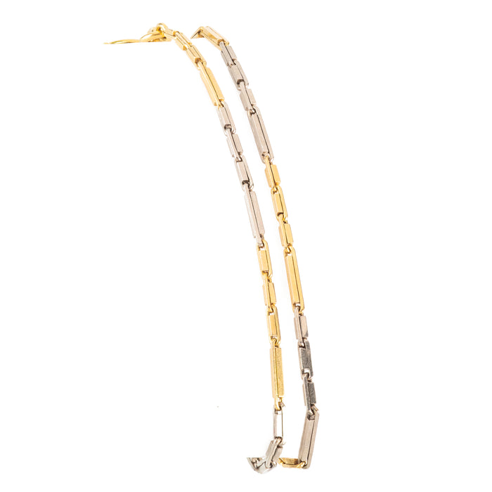 1960s Italian double-wrap bracelet or choker in 18ct gold and platinum, 33cm in length, minimalist sculptural design.