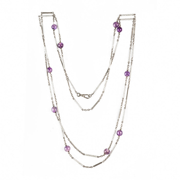 Hallmarked sterling silver necklace with white enamel links and amethyst beads, 148cm long, c.1920
