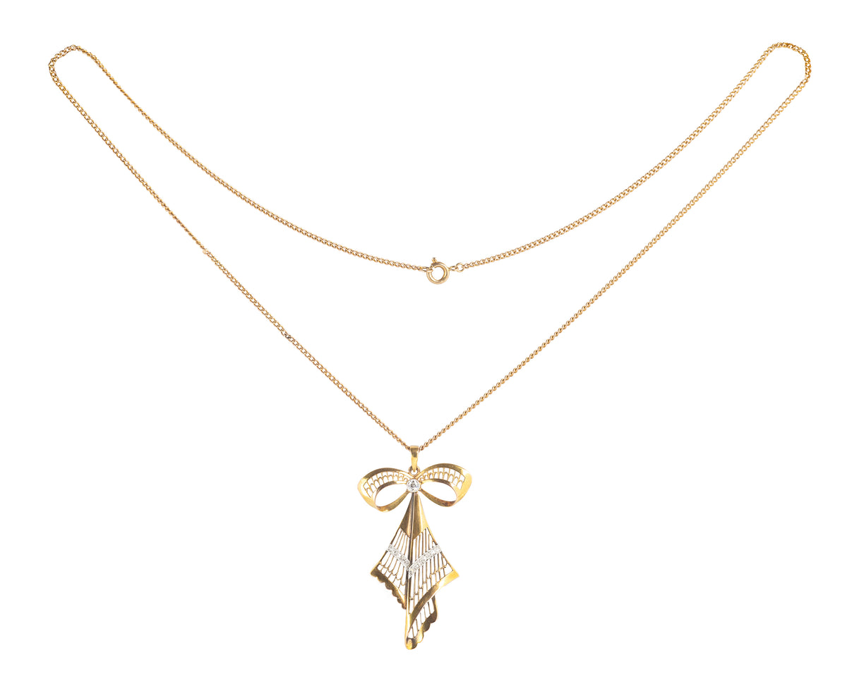 A Diamond and Gold Bow Necklace