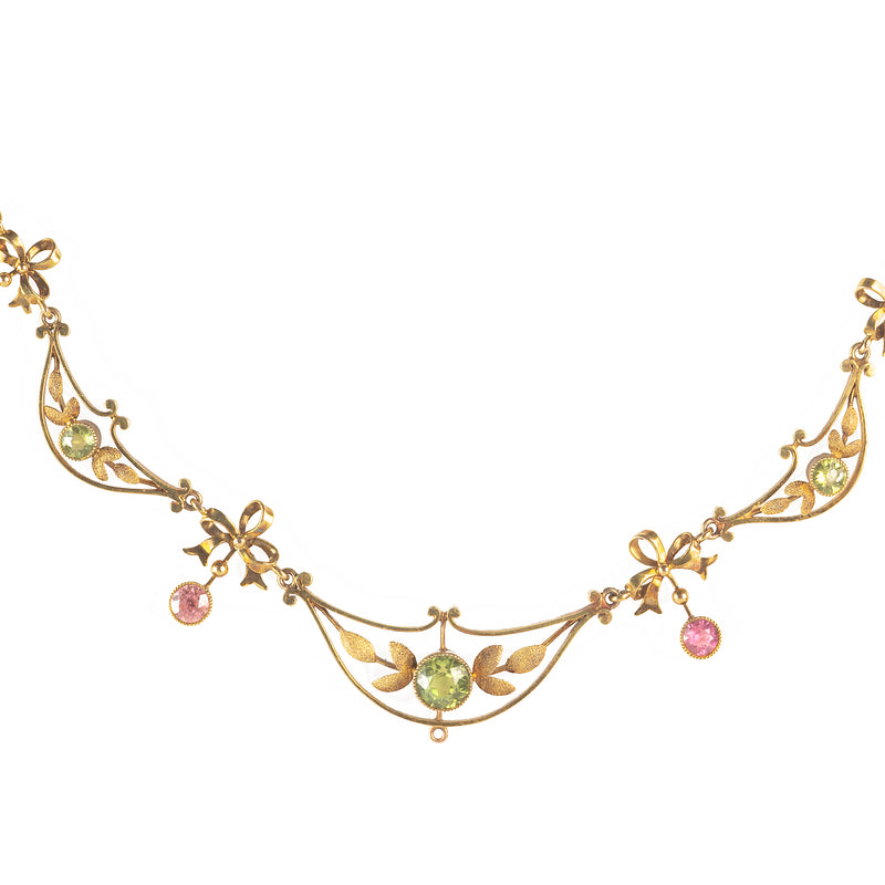 A Fifteen Carat Gold Peridot Tourmaline Necklace