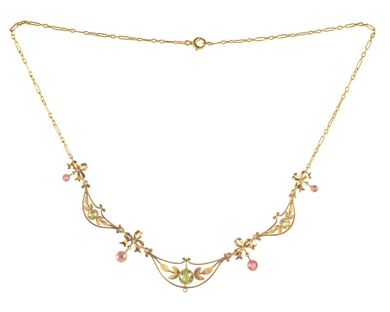 A Fifteen Carat Gold Peridot Tourmaline Necklace