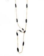 An Onyx and Gold Necklace