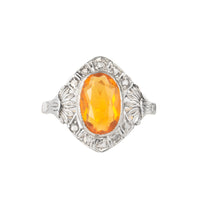 Vintage Calderoni fire opal and diamond ring in 18ct gold and platinum, featuring a vivid orange opal surrounded by rose-cut diamonds.
