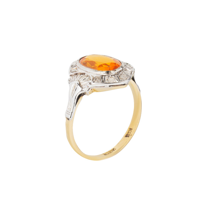 Side view of mid-century Italian fire opal ring by Calderoni, showing platinum detailing and yellow gold shank.