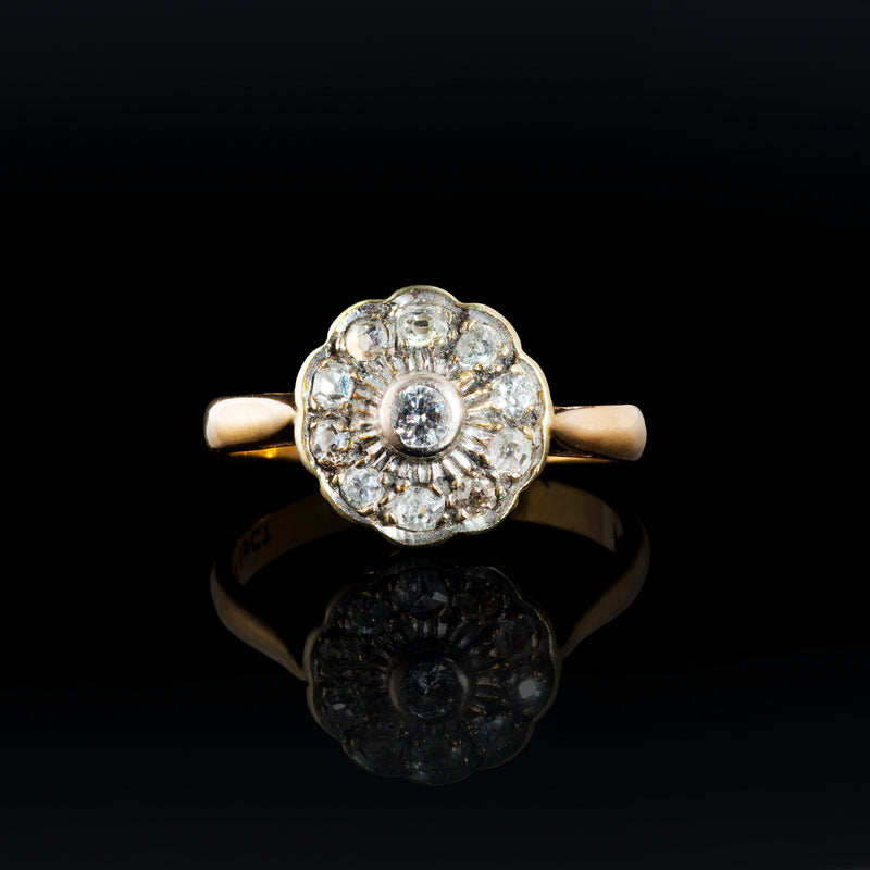 A Platinum Diamond Daisy ring