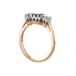 A Three Stone Sapphire Diamond Ring