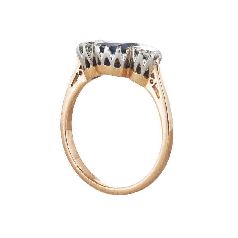 A Three Stone Sapphire Diamond Ring