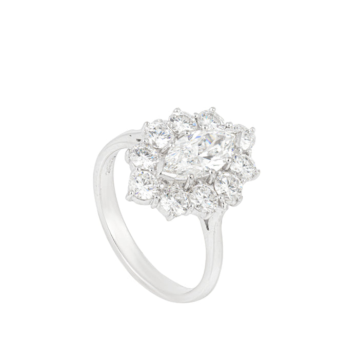 Angled view of this beautiful antique marquise diamond ring with brilliant-cut halo. 