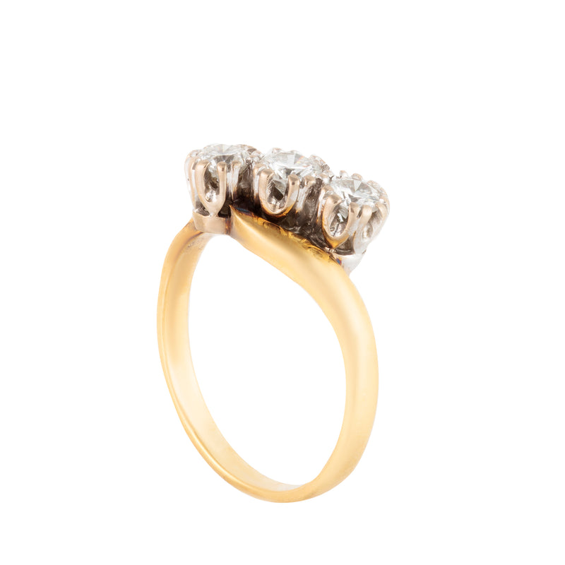 A Three Stone Diamond Gold Ring