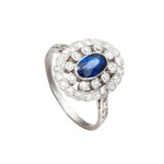 An Oval Sapphire Diamond Platinum Ring