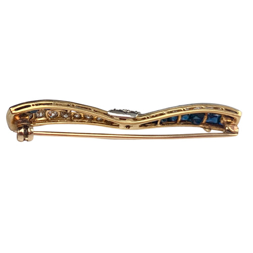 An Art Deco Diamond Sapphire Bow Brooch
