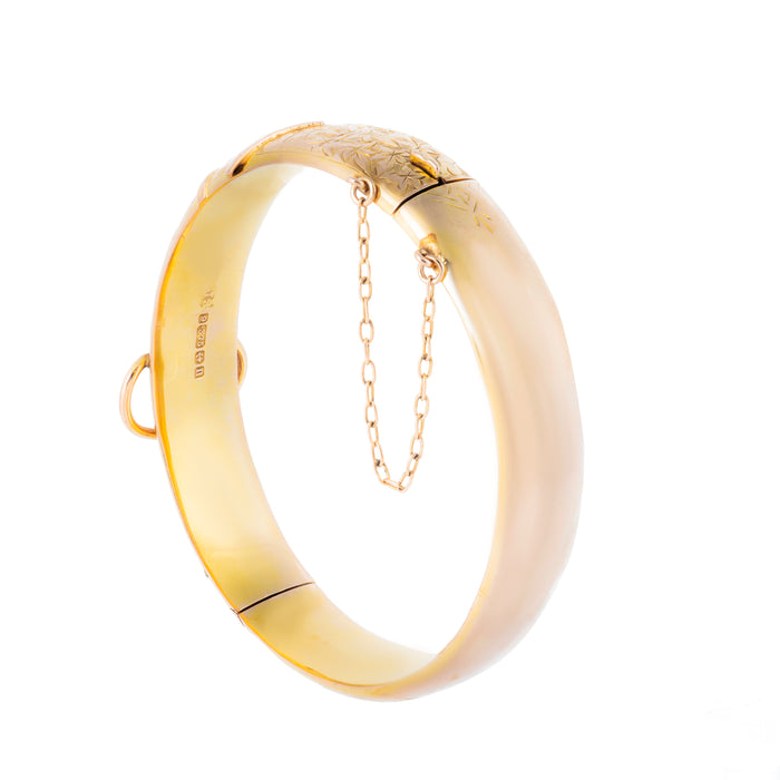 Edwardian gold bangle with safety chain and 1912 Birmingham hallmark, 9 carat