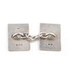 A Pair of Silver Black Enamel Cufflinks