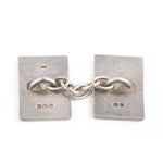 A Pair of Silver Black Enamel Cufflinks
