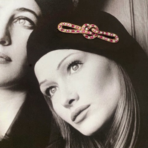 A Ruby Pearl Love Knot brooch