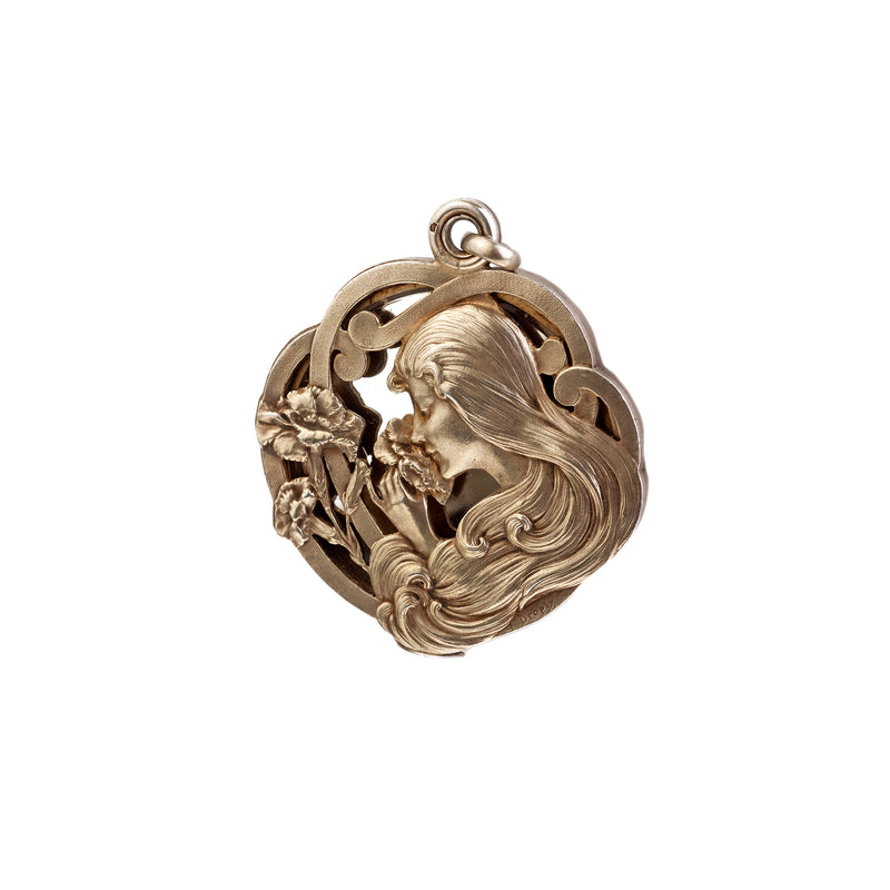 A Silver Art Nouveau Mirror Pendant