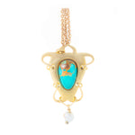 A Turquoise Gold Pendant by Archibald Knox