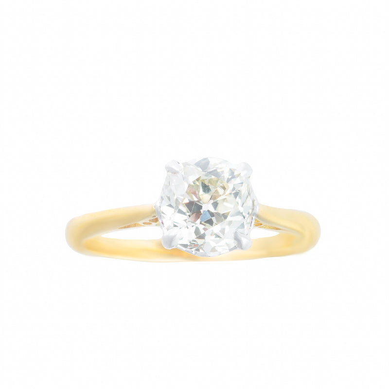 1930s single stone diamond ring in 18ct gold and platinum with a 1.55ct old cushion cut diamond